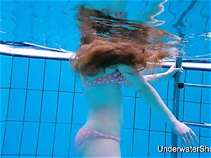 spectacular lady displays killer figure underwater