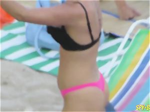 pinkish bikini first-timer sans bra voyeur Beach women